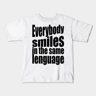 They all smile in the same language Kids T-Shirt